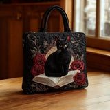 Sac matelassé artisanal - Chat noir sur des livres (matelassé)
